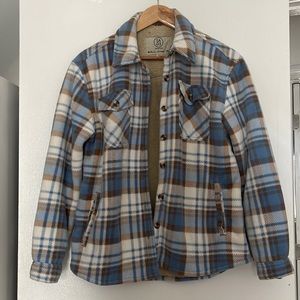 Soft flannel. Very warm and comfy!